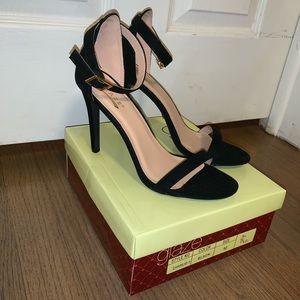 Black strap heel, sized 9.